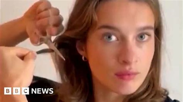What does it mean when a woman cuts off her hair?